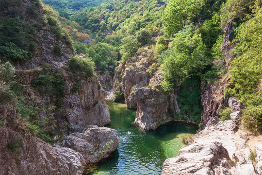 swimmers in the river Ardeche near the devil s bridge