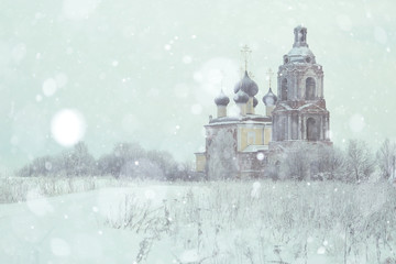 Fototapeta premium Old Orthodox Church in the winter landscape