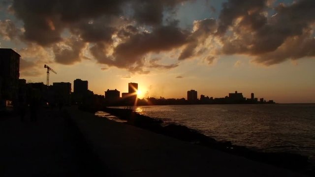 Beautiful sunset on the Malecon with spectacular sky in Old Havana, Cuba