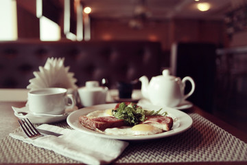 cup of tea or coffee in a cafe serving breakfast table