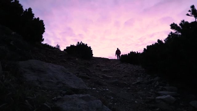Male hiker in the mountain during surise