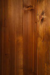 Maple-colored wooden background made of planks