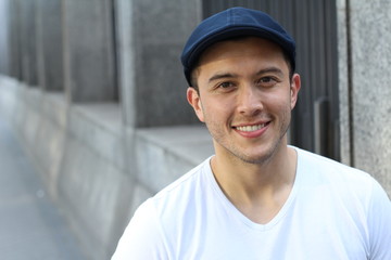 Ethnic stud smiling outdoors isolated with copy space