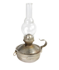 The old kerosene lamp on white background isolate