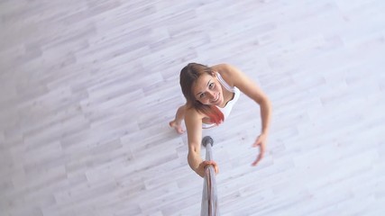 Woman exercise pole dance. Top view. hot sexy girl dancing. Slow motion