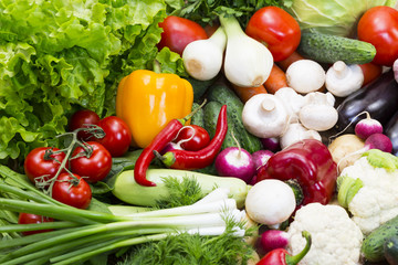 Background of fresh vegetables greens and tomatoes 