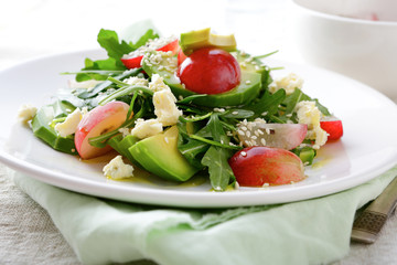 Light Avocado Salad with grape, arugula and cheese
