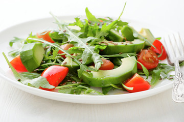 Green Salad with avocado, cherry tomatoes and arugula