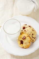 Cookies on a plate and fresh milk