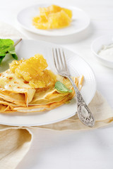 Crepe with honey and sour cream