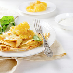 Fresh pancakes with honey for breakfast