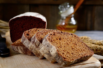 Slices of rye bread on a wooden board