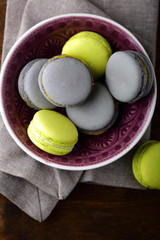 Sweet green and gray macaroon in a plate