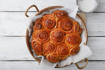 Cinnamon Buns on wooden table
