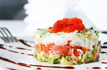 Salad with shrimp, avocado, tomatoes, red caviar, mayo