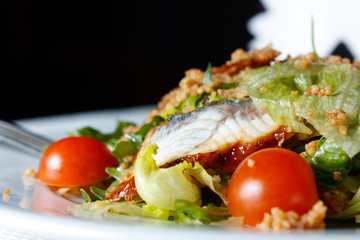Salad with eel and couscous