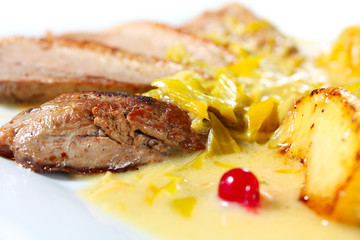 Duck breast with apples and cranberries