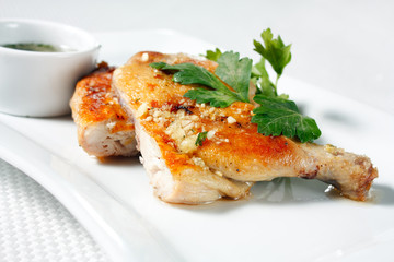 Roasted chicken legs with garlic sauce