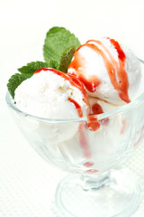 Ice cream is poured strawberry jam