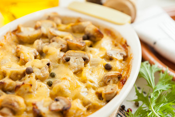 Vegetables Pie with mushrooms, potatoes and cheese closeup