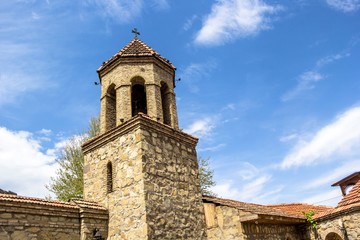 Fototapeta na wymiar Часовня в христианском храме, колоритная архитектура, башня