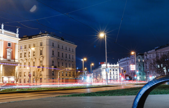 Street with lights and cars at night in Vienna
