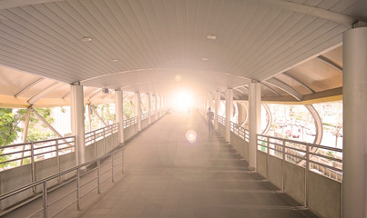 Overpass walk way with light.