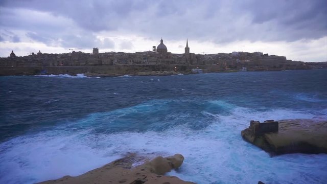 Video of city of Valletta as seen from Silema on a stormy winter morning, Malta