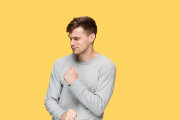 The young man with a raised fist