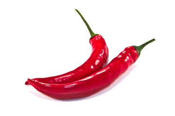 Red hot chilli peppers isolated on white
