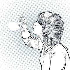 Young girl blowing soap bubbles