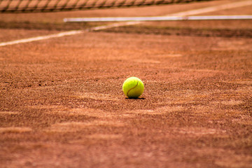 Tennis ball on the dirt court