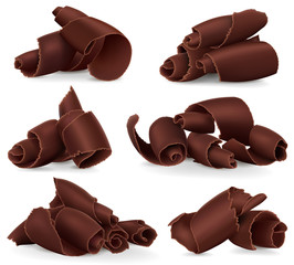 Set of chocolate shavings on white background