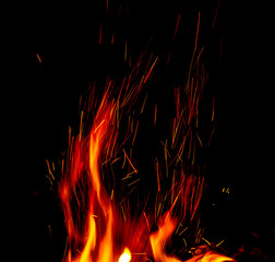 Fototapeta na wymiar Sparks in the Flame of Fire