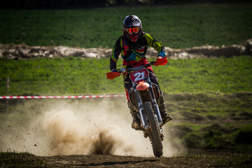 Motocross rider on the crosscountry race