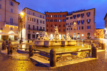 Naklejka na ściany i meble The Fountain of Neptune on the famous Piazza Navona Square at night, Rome, Italy.