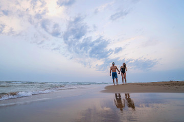 couple walking on the beach