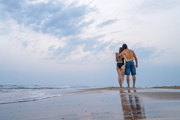 couple walking on the beach
