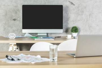 Modern workplace with empty gadgets