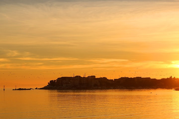 Fototapeta na wymiar Sunset in small coastal town Stobrec near Split, Croatia. 