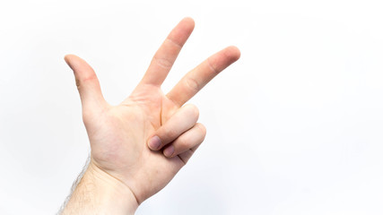 Hand zeigt die Zahl drei