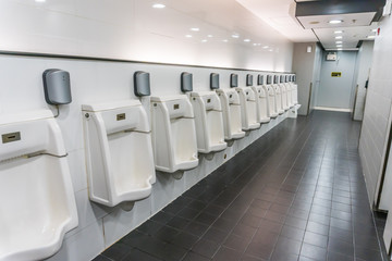 public men toilet room with technology electronic sensor.