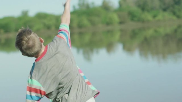 Boy throwing stones