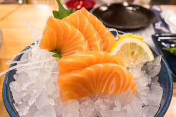 Abstract golden Buddha statue with silver metal frame in temple at Wat Sri Suphan Chiang Mai, Thailand