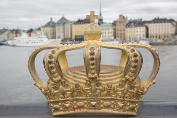 Fototapeta na wymiar Golden Crown on Skeppsholm Bridge - Skeppsholmsbron (1861), Stockholm