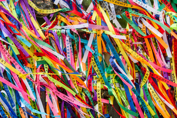 Colored ribbons tied in the grate of the Church of Our Lord of Bonfim in Salvador, Brazil