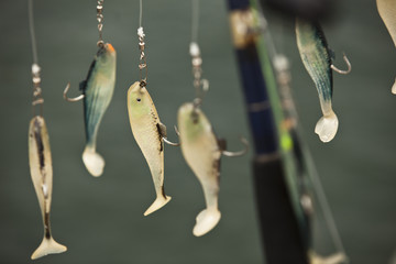 small fishing lures hanging