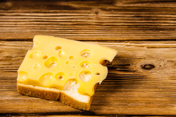 Cheese sandwich on wooden table