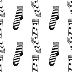Decorative doodle socks. Black and white seamless pattern for coloring book, pages