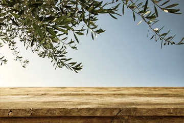 Fotobehang Lege rustieke tafel voor olijfboom achtergrond © tomertu